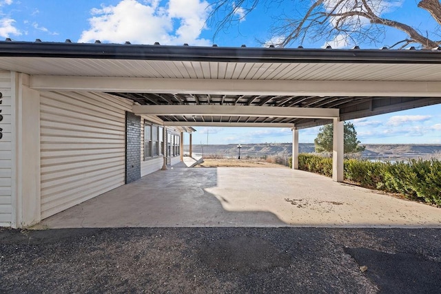 view of patio / terrace featuring a carport