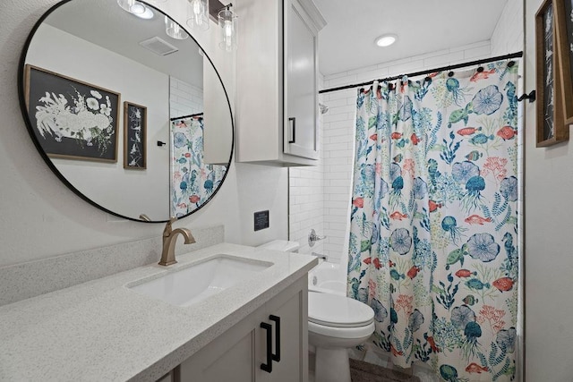 full bathroom featuring shower / bathtub combination with curtain, vanity, and toilet