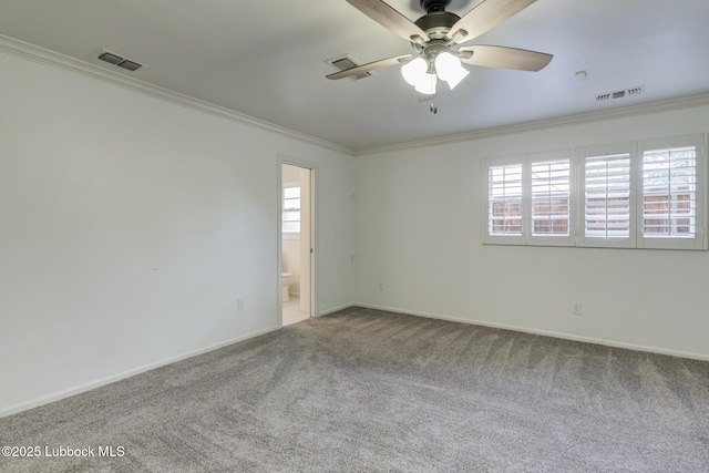 4517 9th St, Lubbock, TX 79416 - carpeted empty room with crown molding, plenty of natural light, a ceiling fan, and baseboards