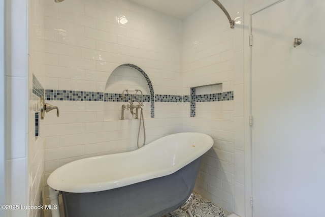 4517 9th St, Lubbock, TX 79416 - full bathroom with tile walls and a soaking tub