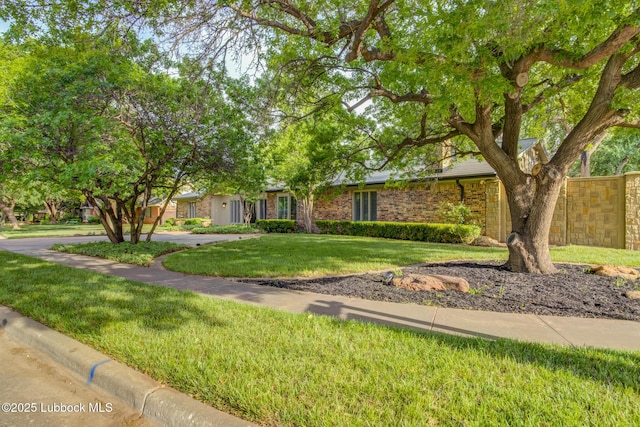 4517 9th St, Lubbock, TX 79416 - view of front of house featuring a front yard