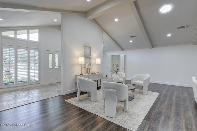 4517 9th St, Lubbock, TX 79416 - living area featuring beam ceiling, baseboards, high vaulted ceiling, wood finished floors, and recessed lighting