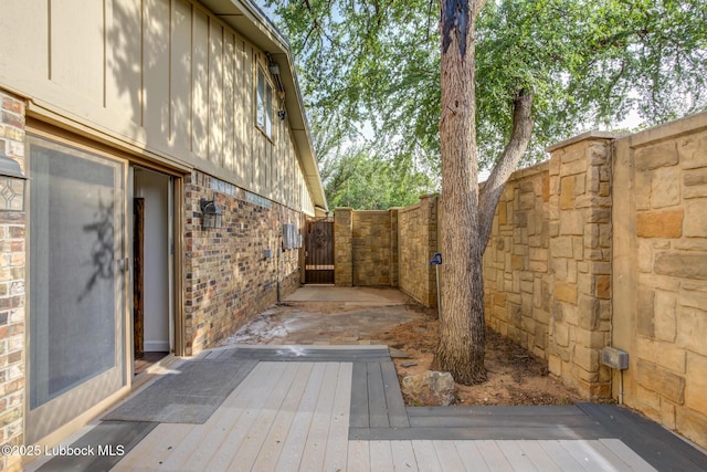 4517 9th St, Lubbock, TX 79416 - wooden terrace featuring a gate and fence