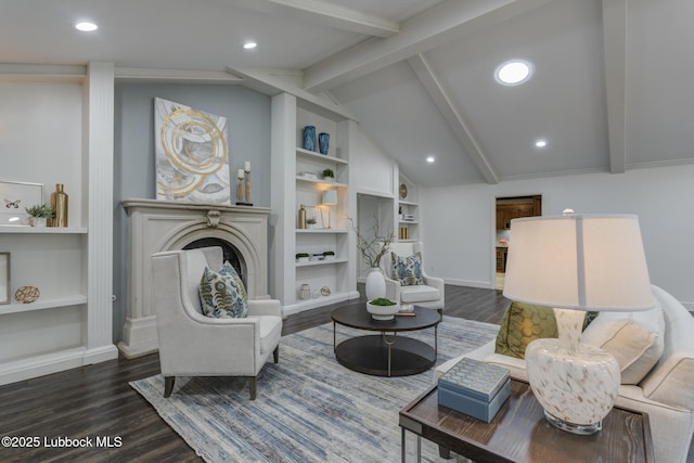 4517 9th St, Lubbock, TX 79416 - living room with built in features, wood finished floors, recessed lighting, and a fireplace with raised hearth