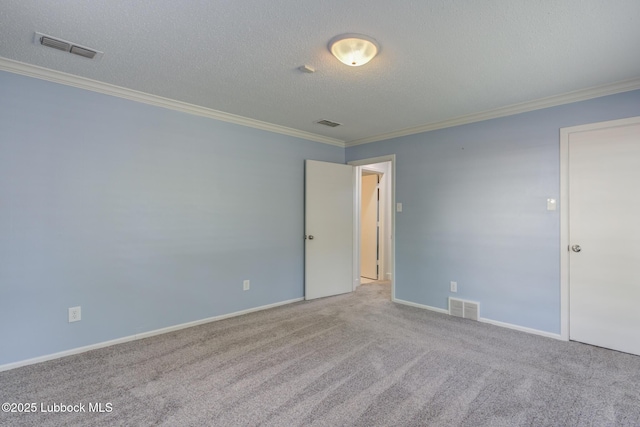 4517 9th St, Lubbock, TX 79416 - carpeted empty room with ornamental molding, a textured ceiling, and baseboards