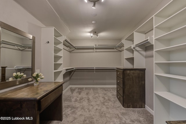4517 9th St, Lubbock, TX 79416 - walk in closet featuring carpet floors