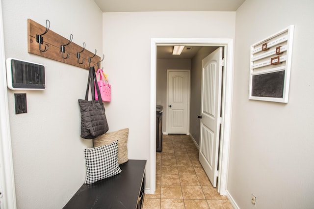 2911 111th St, Lubbock, TX 79423 - mudroom with light tile patterned flooring and baseboards