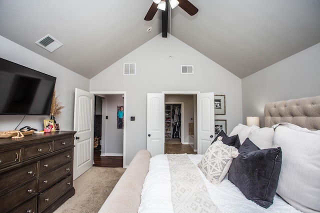 2911 111th St, Lubbock, TX 79423 - bedroom featuring high vaulted ceiling, beamed ceiling, a ceiling fan, a spacious closet, and light colored carpet
