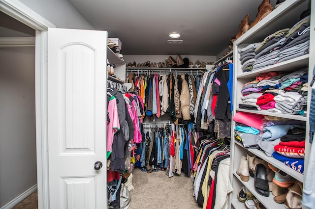 2911 111th St, Lubbock, TX 79423 - spacious closet featuring carpet floors