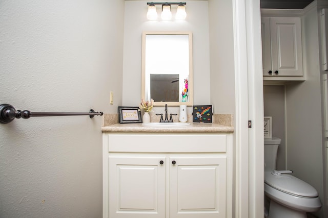 2911 111th St, Lubbock, TX 79423 - bathroom with vanity and a textured wall