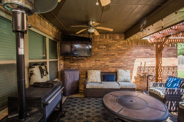 2911 111th St, Lubbock, TX 79423 - living room featuring a ceiling fan, brick wall, and wooden ceiling