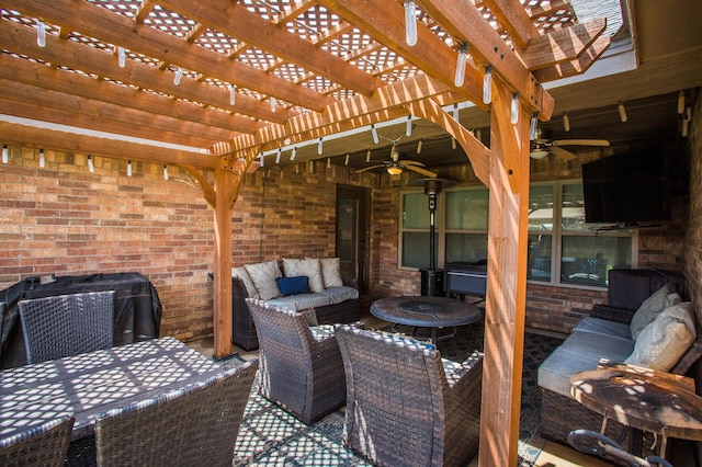 2911 111th St, Lubbock, TX 79423 - view of patio with ceiling fan, an outdoor living space with a fire pit, and a pergola