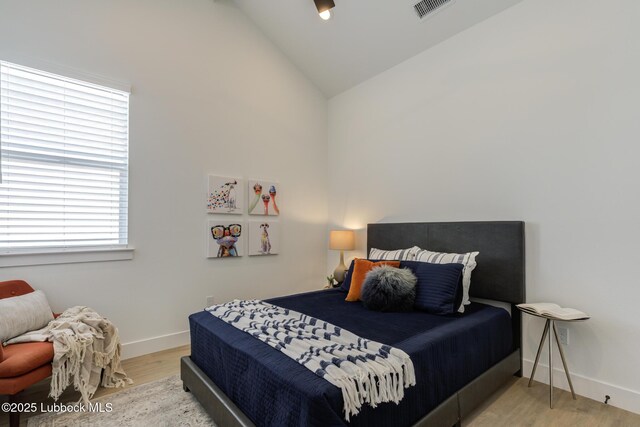 3817 128th St, Lubbock, TX 79423 - bedroom featuring wood finished floors and vaulted ceiling