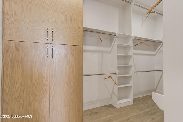 3817 128th St, Lubbock, TX 79423 - walk in closet featuring wood finished floors