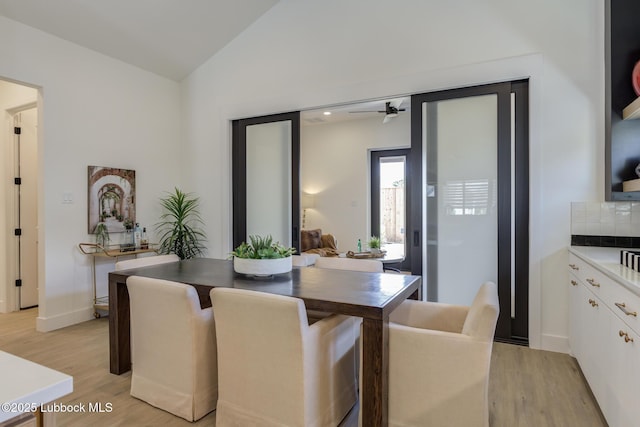3817 128th St, Lubbock, TX 79423 - dining room with light wood finished floors and vaulted ceiling