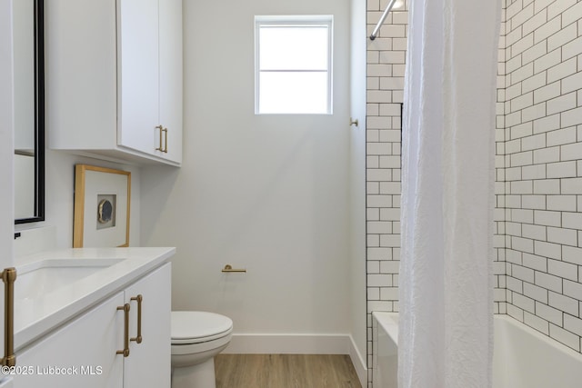 3817 128th St, Lubbock, TX 79423 - full bathroom with vanity, shower / bath combo with shower curtain, and wood finished floors