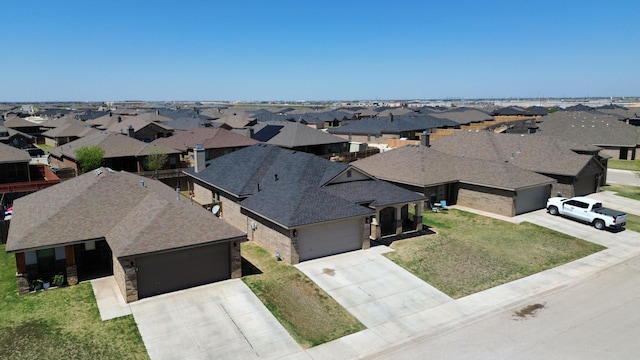 birds eye view of property featuring a residential view
