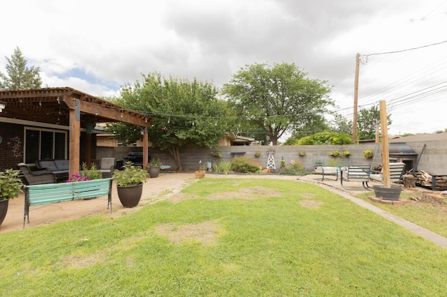 view of yard with an outdoor hangout area and a patio area