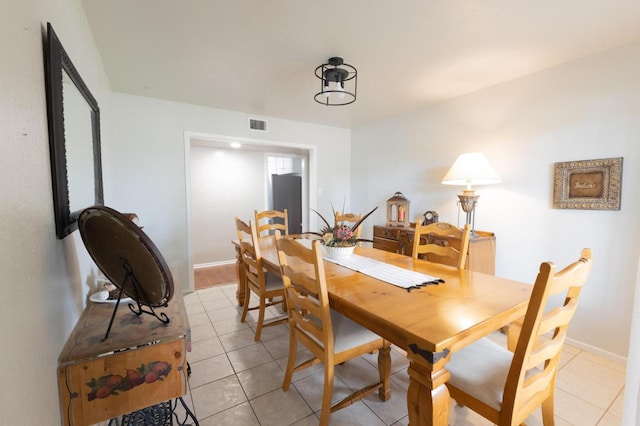 view of tiled dining space