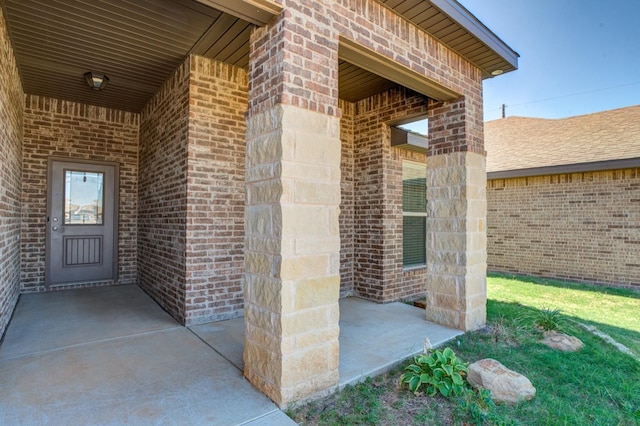 property entrance with a patio area