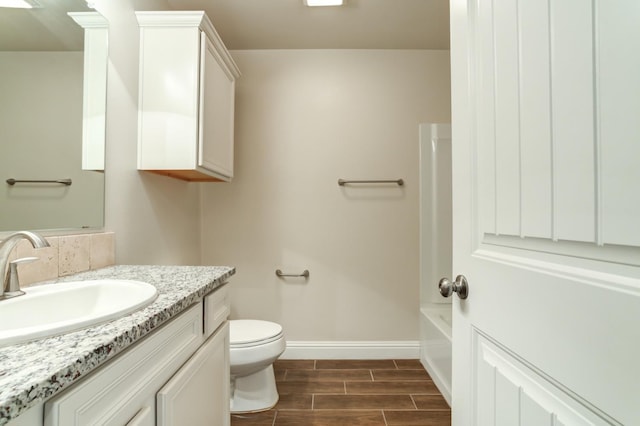 full bathroom featuring vanity, shower / bathing tub combination, and toilet