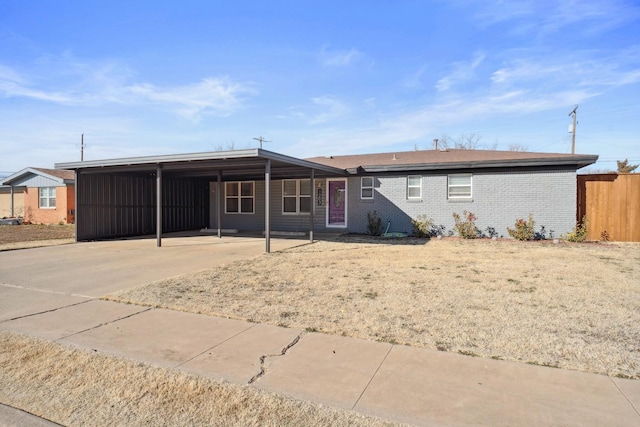 view of front of home featuring a carport