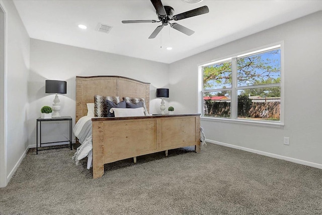 bedroom featuring visible vents, baseboards, and carpet