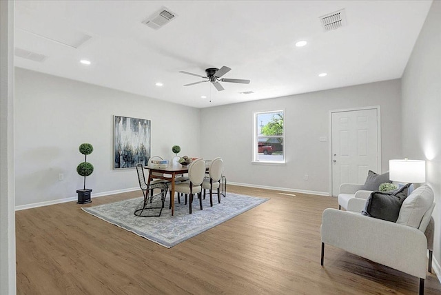 dining area featuring ceiling fan and light hardwood / wood-style flooring