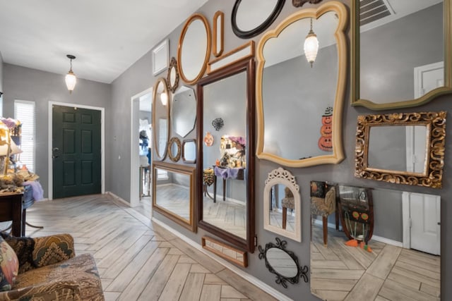 entryway featuring light parquet flooring