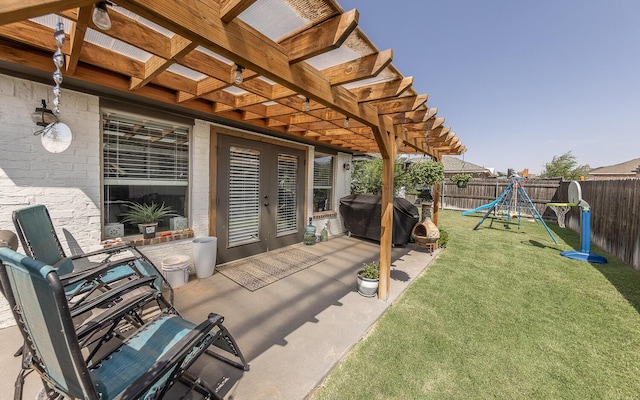 10323 Ave X, Lubbock, TX 79423 - fenced backyard with grilling area, french doors, a playground, a pergola, and a patio