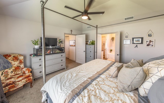 10323 Ave X, Lubbock, TX 79423 - bedroom featuring carpet flooring, lofted ceiling, connected bathroom, and a ceiling fan