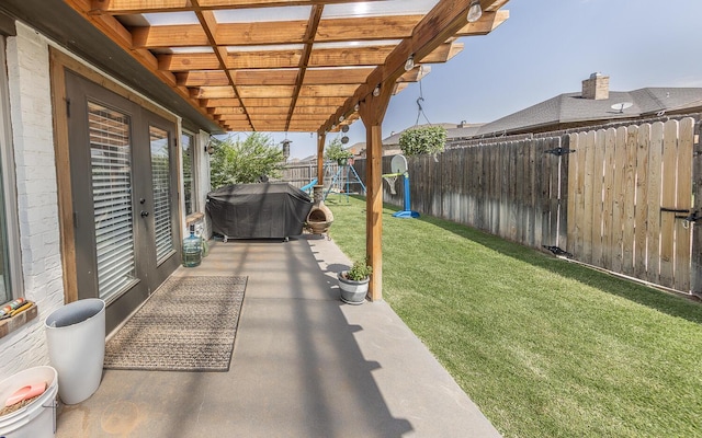 10323 Ave X, Lubbock, TX 79423 - fenced backyard featuring area for grilling