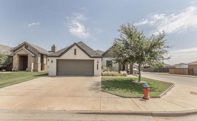 10323 Ave X, Lubbock, TX 79423 - view of front facade with driveway, a front yard, a garage, and brick siding