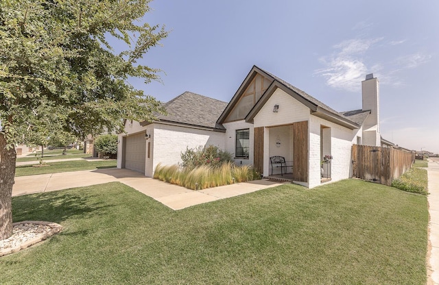 10323 Ave X, Lubbock, TX 79423 - view of front of home featuring brick siding, driveway, a garage, a chimney, and a shingled roof