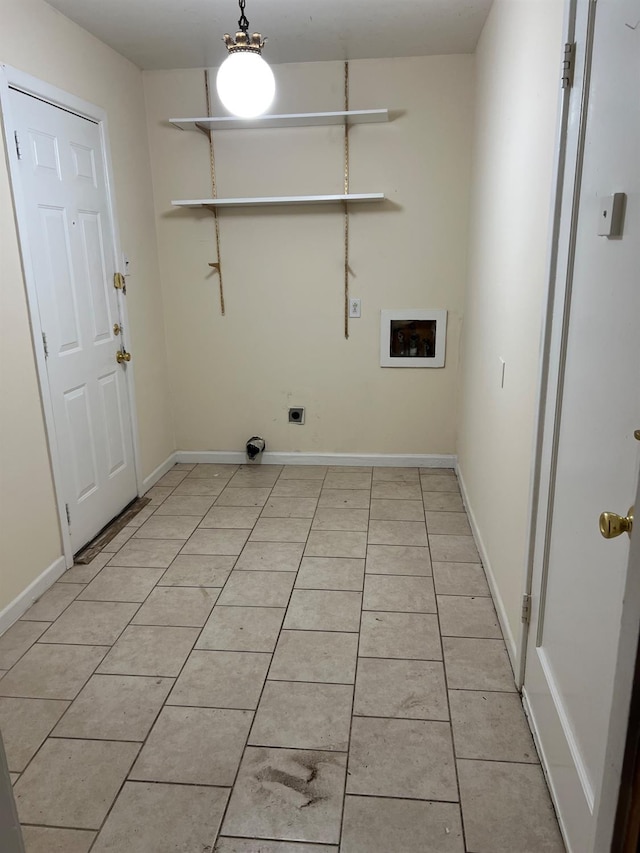 clothes washing area featuring hookup for a washing machine, light tile patterned flooring, and hookup for an electric dryer