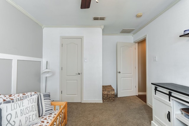 living area featuring carpet floors, ornamental molding, and ceiling fan