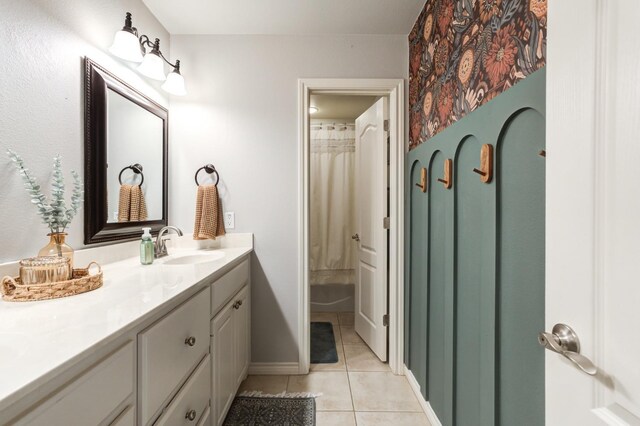 bathroom featuring tile patterned floors and vanity