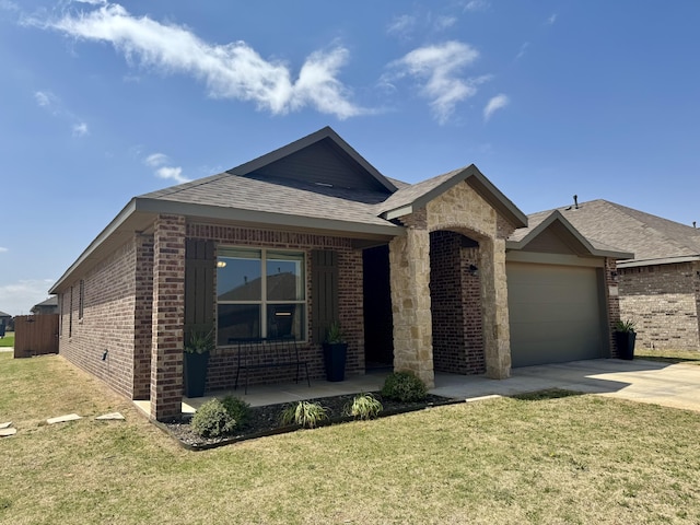 7101 22nd St, Lubbock, TX 79407 - ranch-style house featuring brick siding, concrete driveway, a garage, and a front lawn