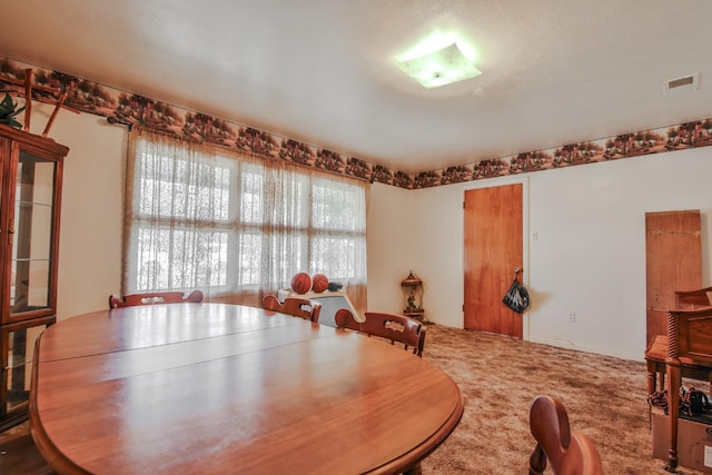 dining area featuring carpet floors