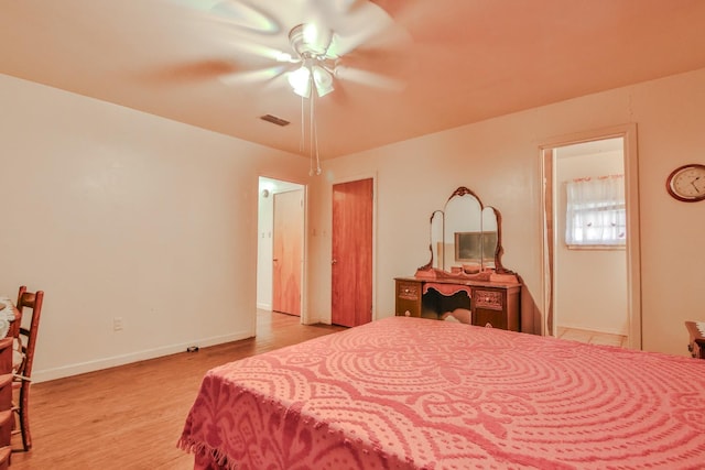 bedroom with light wood-type flooring and ceiling fan