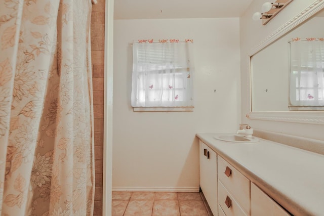 bathroom with vanity and tile patterned floors