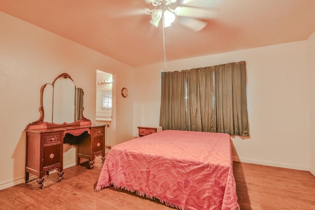 bedroom featuring ceiling fan and wood-type flooring