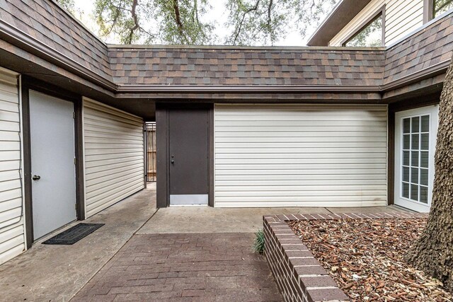 entrance to property with a patio