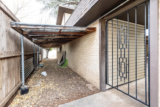 view of home's exterior featuring a carport