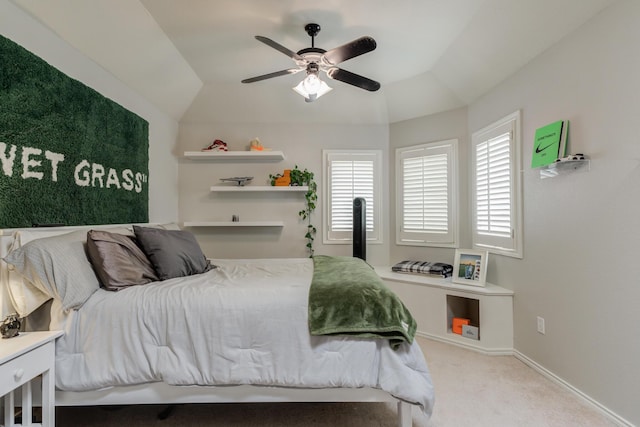 carpeted bedroom featuring ceiling fan and baseboards