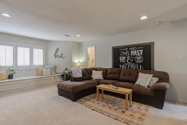 carpeted living room featuring recessed lighting and visible vents