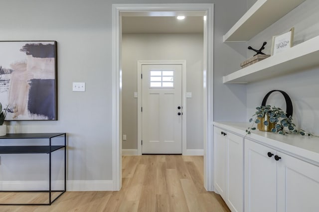 foyer entrance featuring light hardwood / wood-style flooring