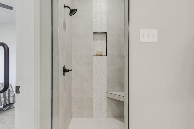 bathroom featuring an enclosed shower