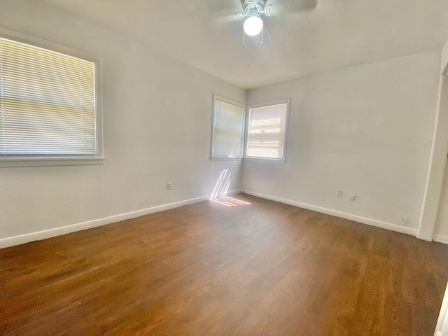 unfurnished room with wood-type flooring and ceiling fan