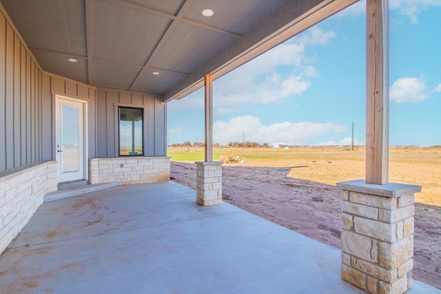 view of patio with a rural view